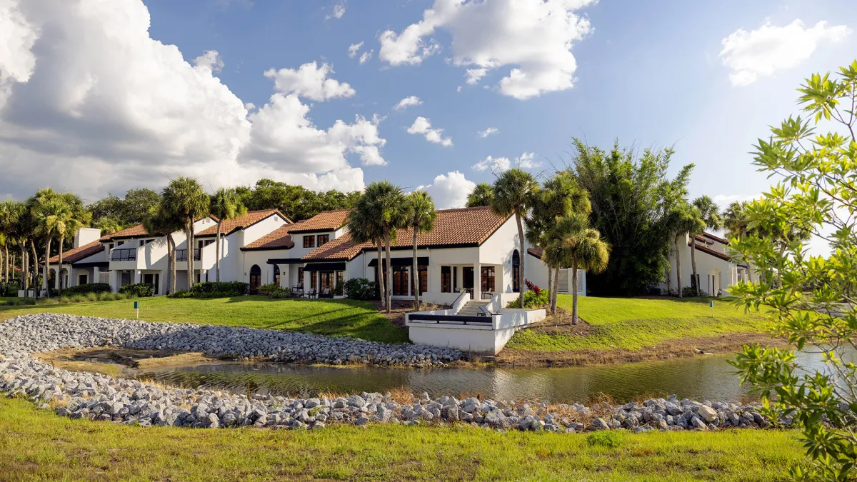 Garden View Villas An image of the exterior of Garden View Villas at Evermore Orlando Resort.