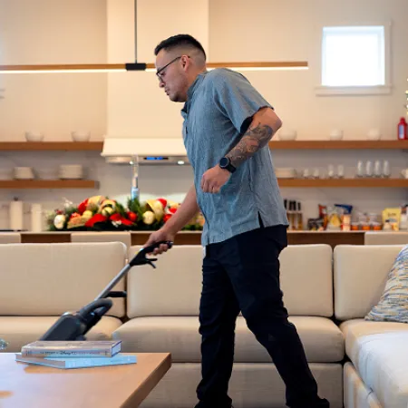 Man Cleaning House