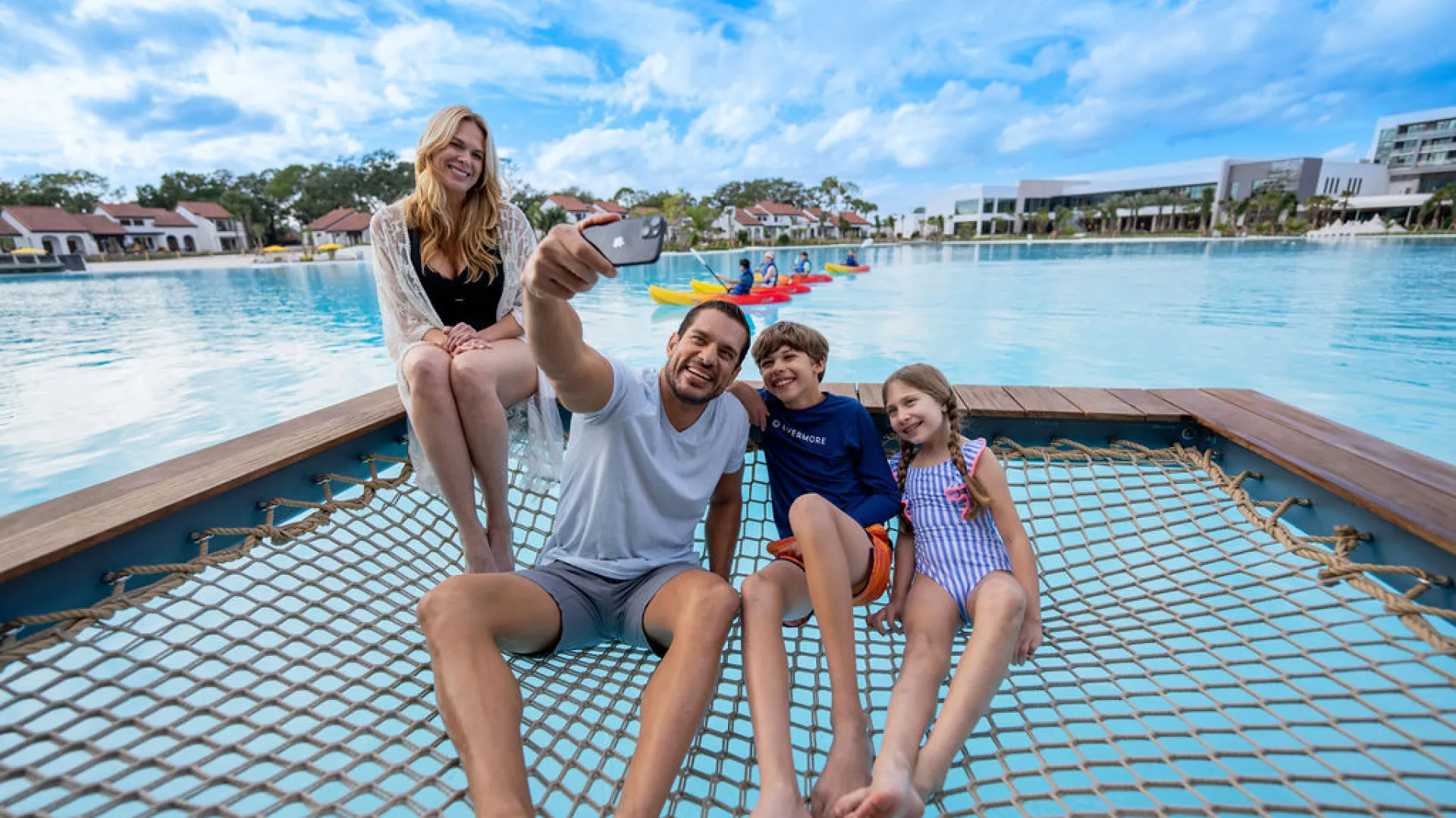 Family taking selfie picture in cabana