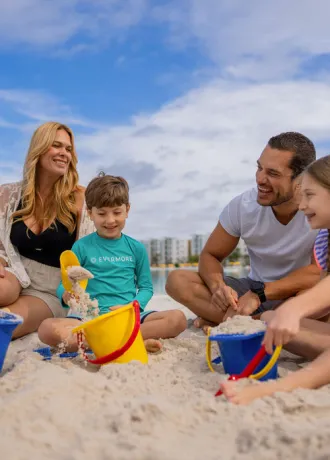 Family beach time Family playing in the sand