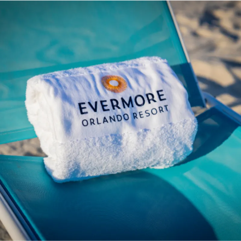 Towel sitting on blue outdoor seating Towel sitting on blue outdoor seating