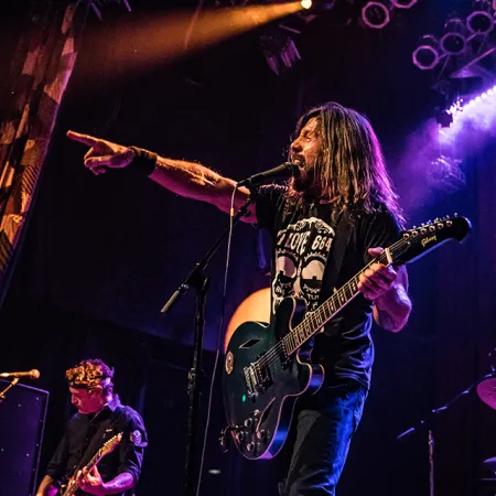 An image of the Fooz Fighters band, who will be performing in the Evermore Concert Series at Evermore Orlando Resort.