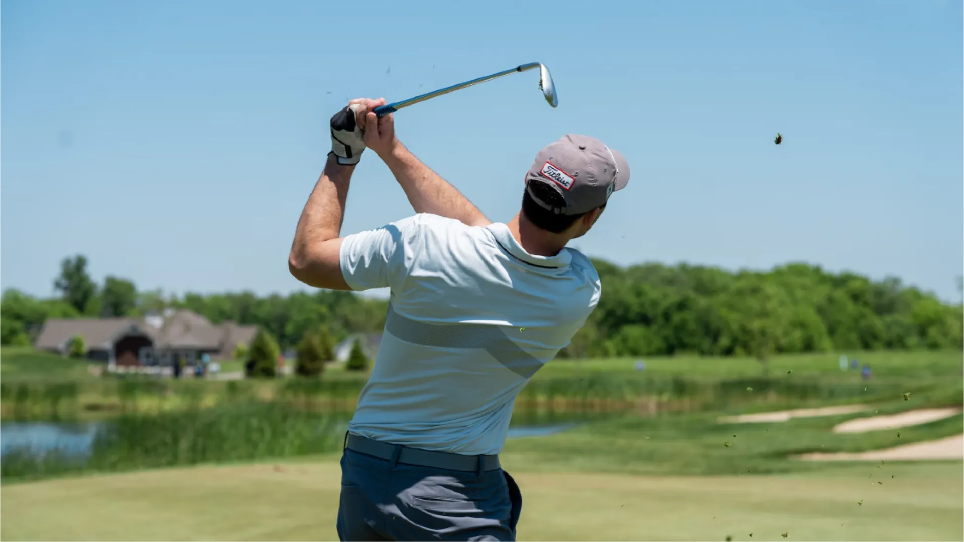 Golfer Mid-Swing Golfer mid-swing on Grand Cypress Golf course